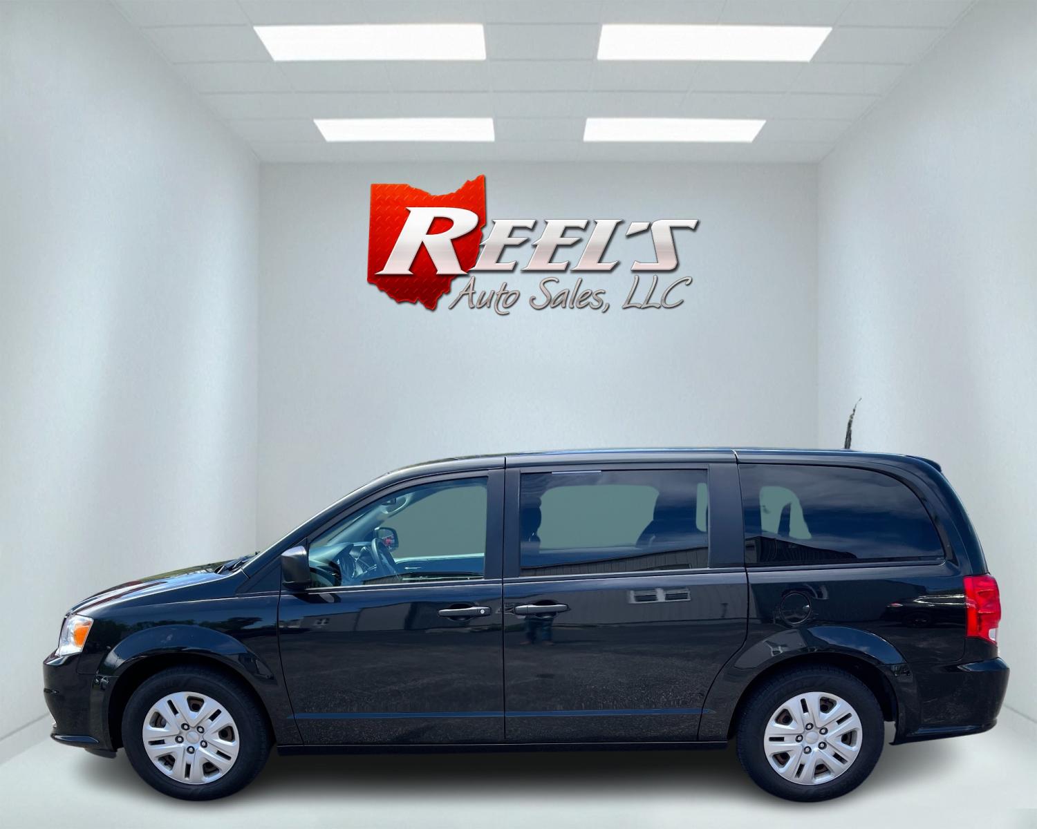 2019 Black /Black Dodge Grand Caravan SE (2C4RDGBG6KR) with an 3.6L V6 DOHC 24V engine, 6A transmission, located at 547 E. Main St., Orwell, OH, 44076, (440) 437-5893, 41.535435, -80.847855 - This 2019 Dodge Grand Caravan SE presents a practical and spacious option for families or travelers needing room for seven passengers. Powered by the robust 3.6L Pentastar V6 engine paired with a 6-speed automatic transmission, it delivers a smooth and reliable driving experience. This model boasts - Photo #8